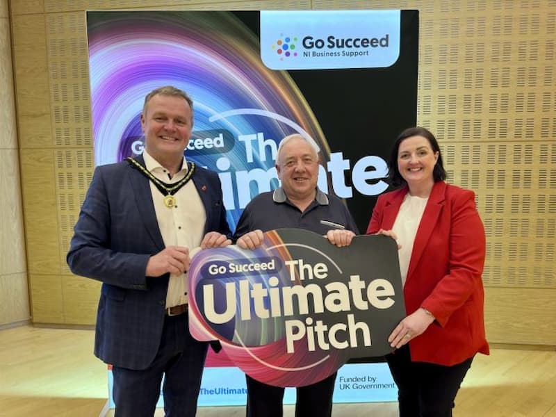 Joe Garvey, Founder of Macha's Orchard, reveiving the Ultimate Pitch Award for Macha's Orchard